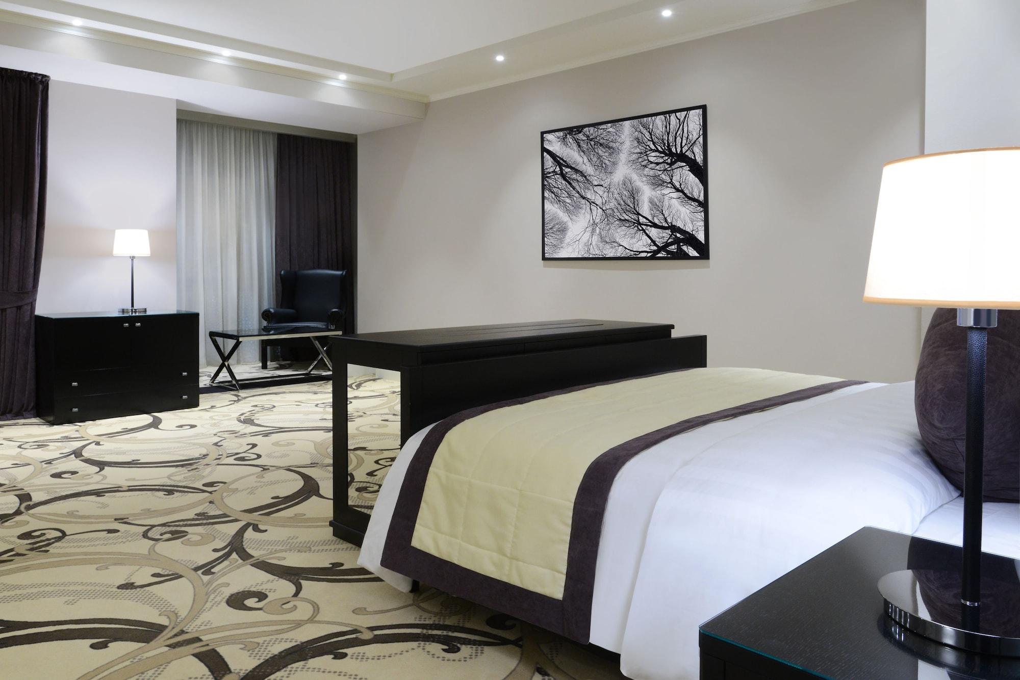 Ambassadori Tbilisi Hotel Exterior photo A room at the hotel