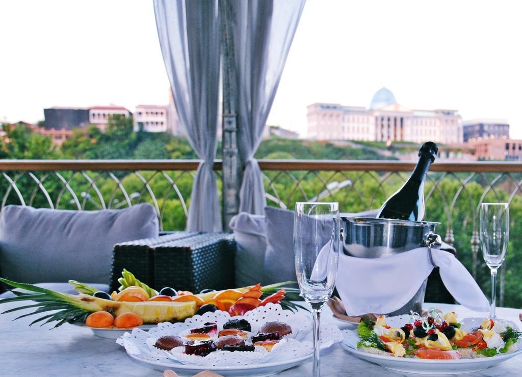 Ambassadori Tbilisi Hotel Exterior photo A view of the city from the hotel