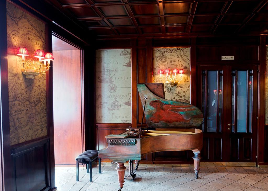 Ambassadori Tbilisi Hotel Exterior photo The piano in the lobby of the Hotel de Ville